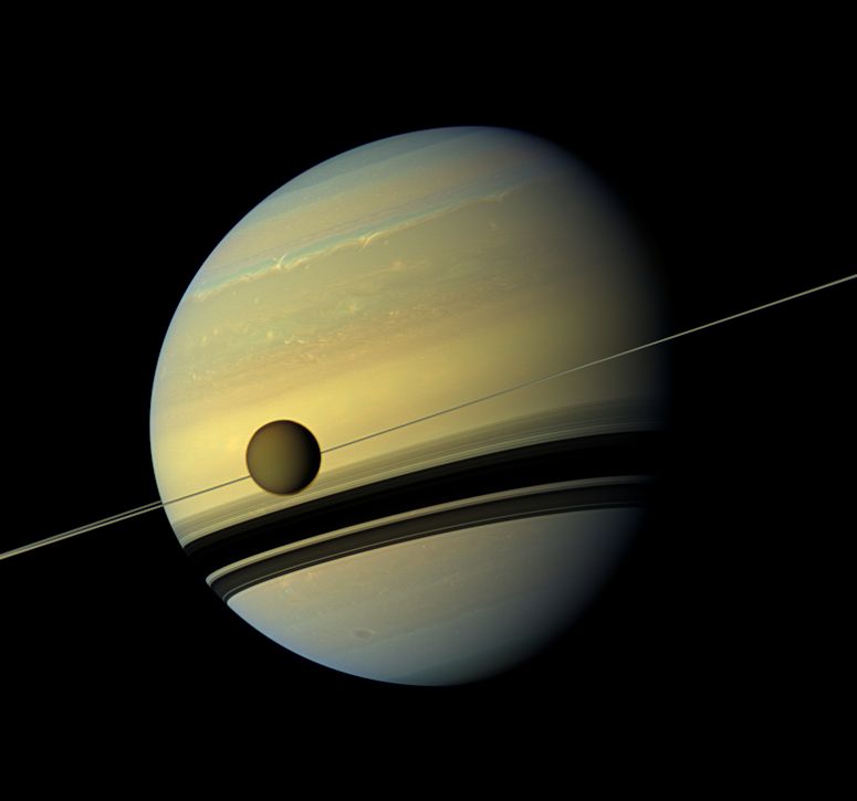 A beautiful photo of Saturn and Titan, taken by the Cassini spacecraft.